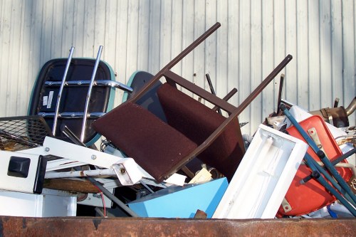 Shoreditch recycling center with bins and collection trucks
